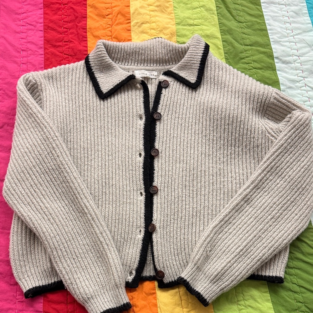 Elegant Beige Cardigan with Black Accents